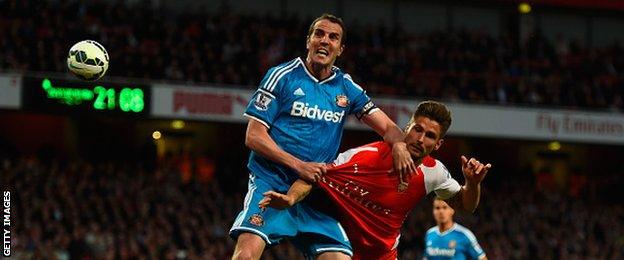 John O'Shea and Olivier Giroud