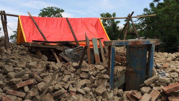Remains of house in which a mother and her young son died, in a village in the Chhampi district near Kathmandu