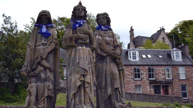 Statues wearing scarves