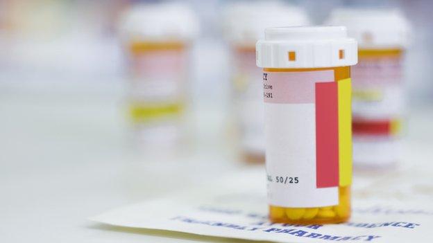 Medicine bottles in a pharmacy