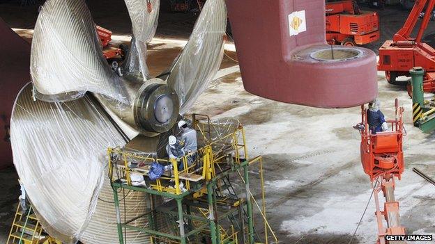 A massive propeller being fitted