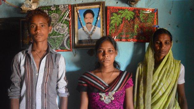 Janabai Ghodam, with her daughter and son