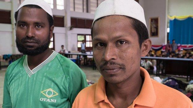 "We don't want to leave our motherland", said Mohammad (right) - a Rohingya migrant