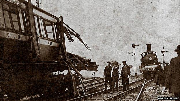 The wrecked leading coach of the local train