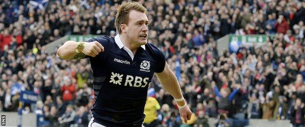 Stuart Hogg celebrates scoring for Scotland against Wales