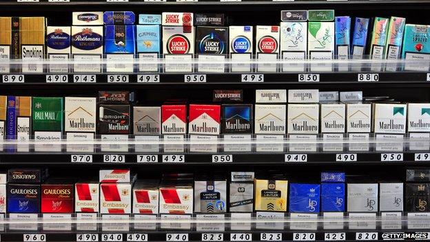 Cigarettes on shelves in a shop