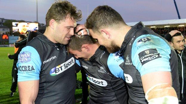 Sean Lamont (left) and Tommy Seymour (right) celebrate their win with Glasgow Warriors try scorer DTH Van Der Merwe