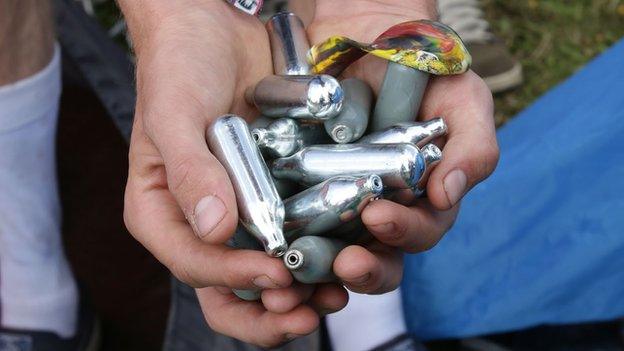 Nitrous oxide canisters discarded at a music festival