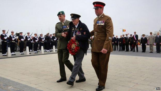 Dunkirk veteran Arthur Taylor, accompanied by his grandsons Major Stuart Taylor (left) and WO2 Ian Taylor