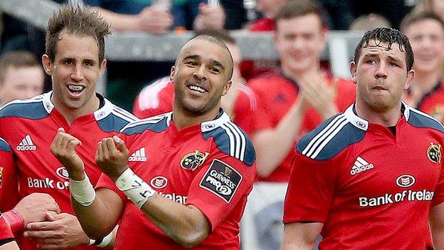 Simon Zebo (centre) celebrates after scoring Munster's first-halt try at Thomond Park