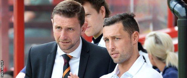 Ian Baraclough looks on with rested striker Scott McDonald