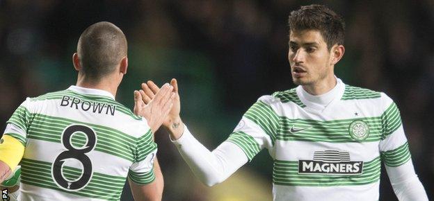 Nir Bitton (right) says he's happy at Celtic