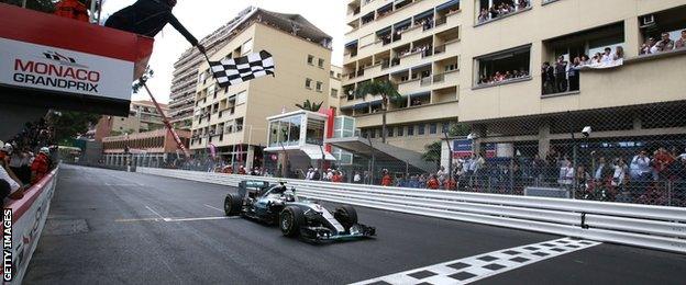 Nico Rosberg crosses the finish line