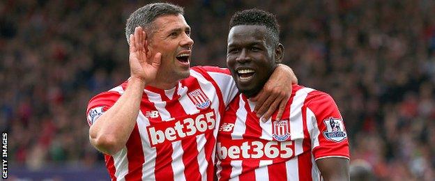 Stoke's Jonathan Walters (left) celebrates scoring against Liverpool