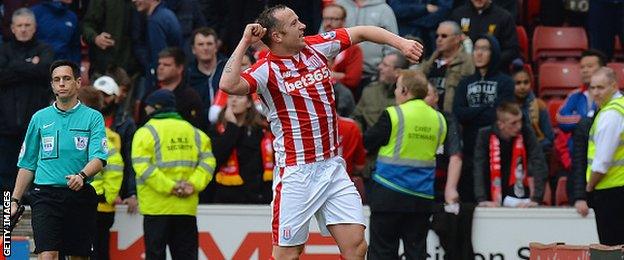 Stoke midfielder Charlie Adam celebrates scoring against Liverpool