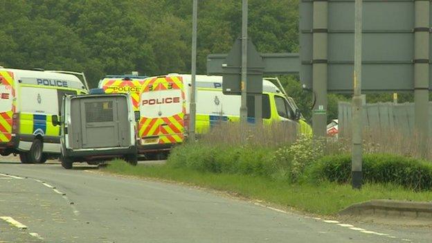 Police vans at the scene in Lincolnshire