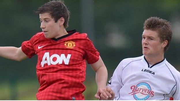 Paddy McNair in Milk Cup action for Manchester United against Revo Express in Ballymoney