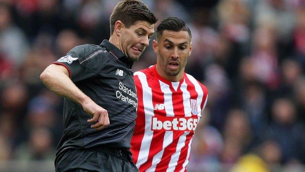 Stoke City defender Geoff Cameron challenges Steven Gerrard in the Liverpool captain's final game