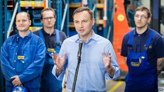 Andrzej Duda speaks as he visits a screw and bolt factory near Warsaw - 13 May 2015