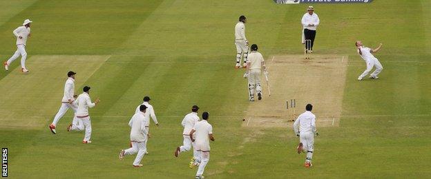 Ben Stokes (left) celebrates taking a wicket