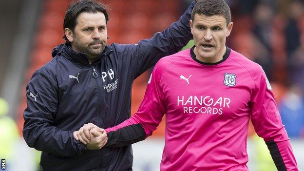 Dundee manager Paul Hartley and Kyle Letheren