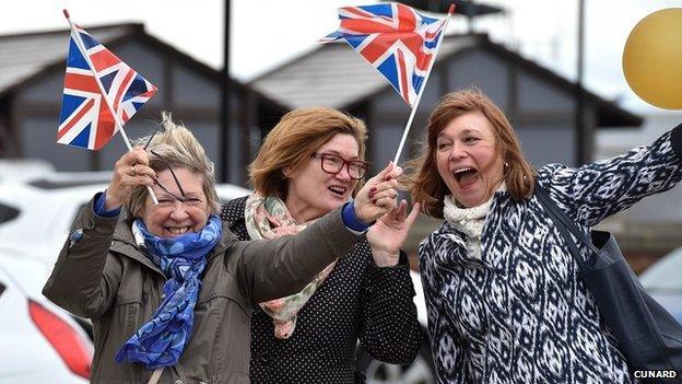 People wave goodbye to Queen Victoria