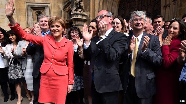 SNP MPs assemble outside the Houses of Parliament