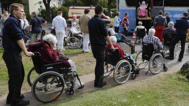 Disabled pensioners being moved to a nursing home