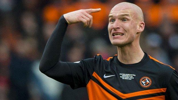 Jaroslaw Fojut shows his emotions with Dundee United