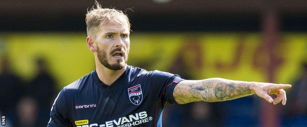 Martin Woods playing for Ross County