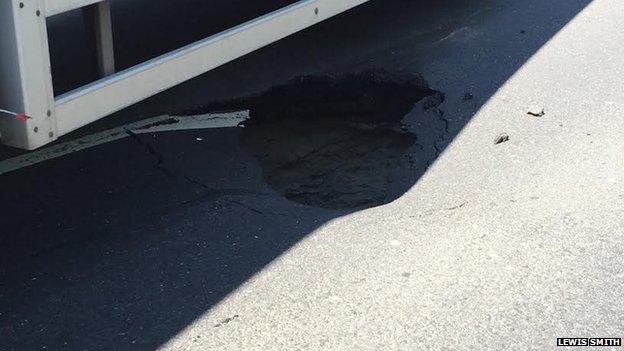 Sinkhole underneath lorry