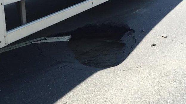 Sinkhole underneath lorry