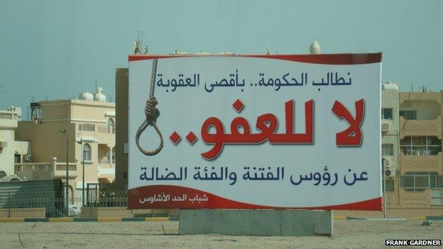 Inflammatory poster put up by Sunni hardliners in 2011 calling for no pardon for leading rioters; later taken down by the government