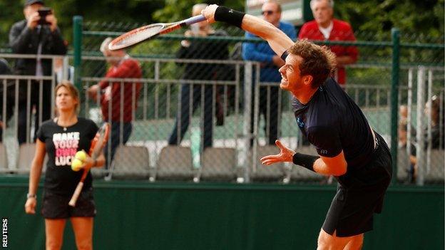 Andy Murray watched by Amelie Mauresmo