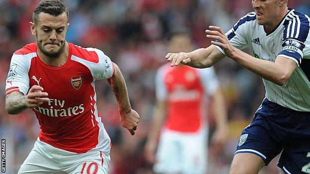 Arsenal's Jack Wilshere (left) in action against West Brom