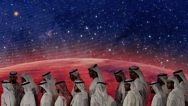 United Arab Emirates (UAE) officials, engineers and scientists take part in a ceremony to unveil UAE's Mars Mission on May 6, 2015 in Dubai