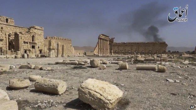 Screen grab of a militant video posted on YouTube on on 26 May 2015, purportedly showing smoke rising behind archaeological ruins in Palmyra, Syria