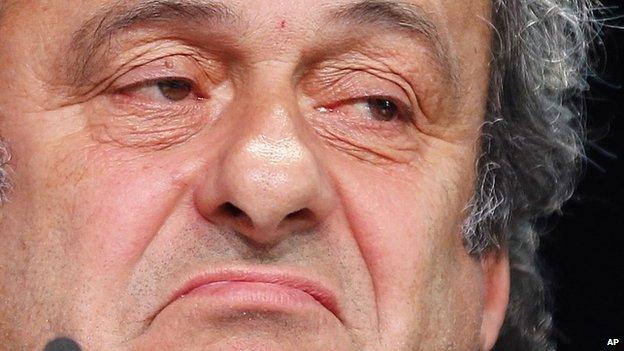 President of UEFA Michel Platini grimaces during a press conference following a meeting of the UEFA board ahead of the FIFA congress in a hotel in Zurich, Switzerland, Thursday, May 28, 2015.