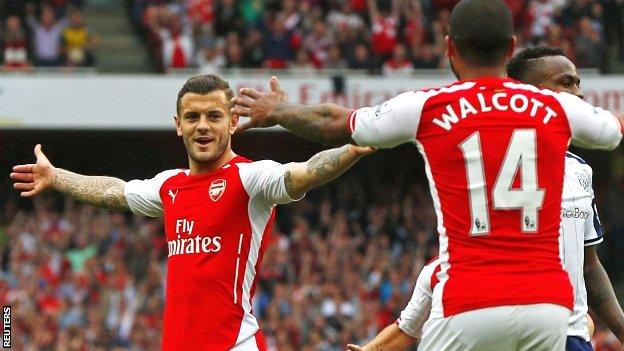 Arsenal's Jack Wilshere celebrates his goal against West Brom with Theo Walcott