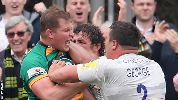 Dylan Hartley (left) clashes with Saracens' Jamie George