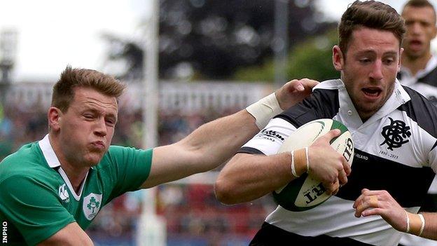 Ireland winger Craig Gilroy cannot prevent Alex Cuthbert scoring the opening try for the Barbarians