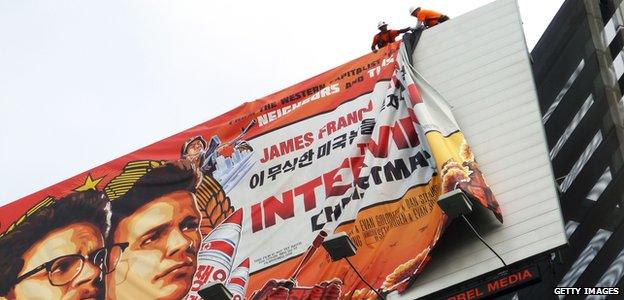 The Interview banner being taken down