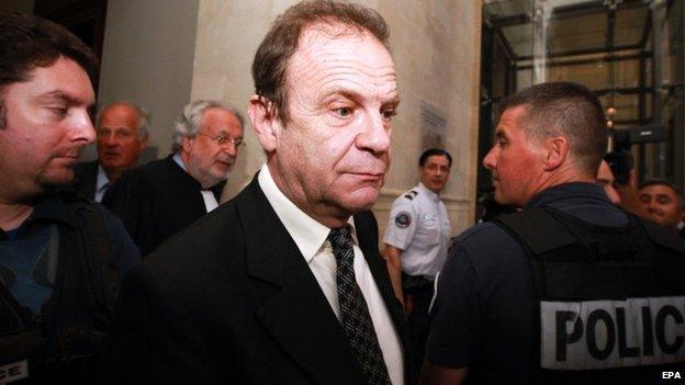 Francois Marie Banier leaves the courtroom after the verdict in the trial of ten people charged with exploiting L"Oreal heiress Liliane Bettencourt