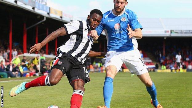 Lenell John-Lewis (L) in action for Grimsby Town