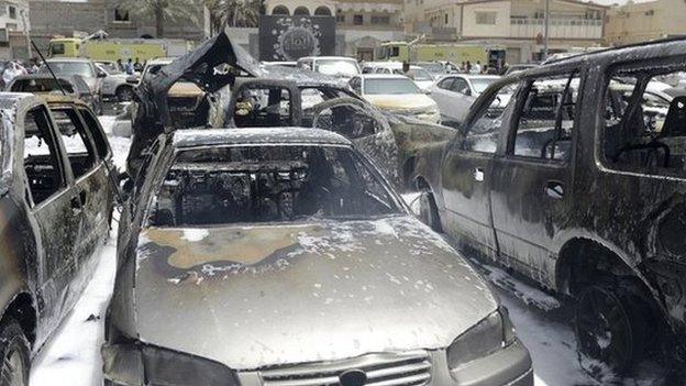 Damaged cars are seen after a car exploded near a Shia mosque in Saudi Arabia's Dammam 29 May 2015.