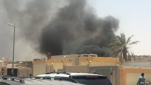 Smoke rises after a car exploded near a Shia mosque in Saudi Arabia's Dammam 29 May 2015.