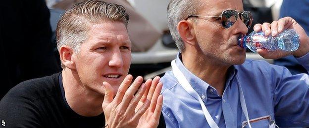 Bastian Schweinsteiger of Bayern Munich watching Ana Ivanovic