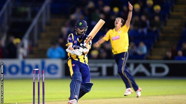 Chris Wood of Hampshire celebrates taking the wicket of Wayne Parnell of Glamorgan