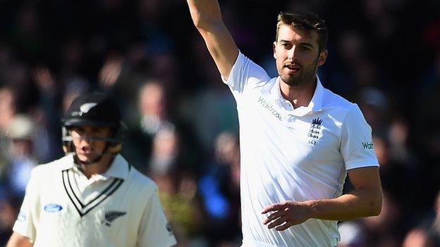 England's Mark Wood celebrates a wicket