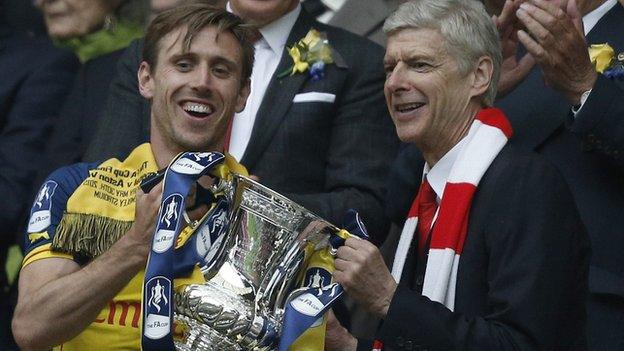 Arsene Wenger and Nacho Monreal with the FA Cup